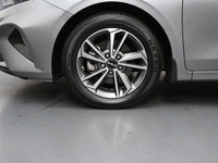 Experience refined performance and modern comfort with the 2024 Kia Forte 5 EXâ€”a sleek, sporty hat... (image 3)