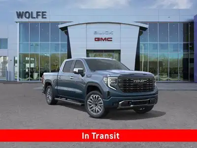 The 2025 GMC Sierra 1500 Denali Ultimate, finished in Downpour Metallic with a refined Alpine Umber...