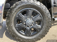 The 2014 Ram 3500 Laramie is a heavy-duty pickup truck that blends robust capability with a comforta... (image 6)