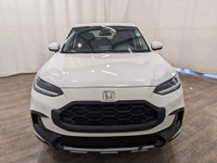 No Accidents, Service Records Available! HPD Kit The 2023 Honda HR-V EX-L Navi AWD in a pristine whi... (image 1)