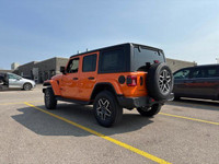 This Jeep Wrangler has a trusty Regular Unleaded V-6 3.6 L/220 engine powering this Automatic transm... (image 5)