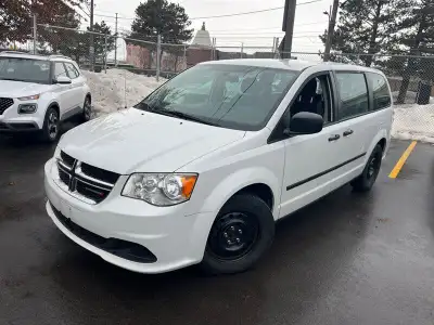 Looking for a minivan that's more Canadian than maple syrup on poutine? Check out this 2015 Dodge Gr...