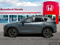 Experience the confident handling and smooth ride of this 2024 Mazda CX-5 GS, boasting only 6904 kil... (image 1)