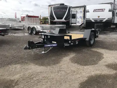 SURE-TRAC SINGLE AXLE 62" X 10' TILT DECK CAR HAULER Perfect for a sky lift, scissor lift, bobcat, a...