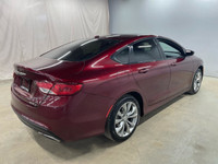 Looking for a stylish and sporty sedan that turns heads? Feast your eyes on this vibrant red 2015 Ch... (image 5)