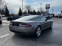 Experience luxury and performance with our exquisite Silver Aston Martin DB9 2dr Coupe Automatic. De... (image 4)