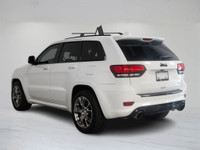 This 2015 Jeep Grand Cherokee SRT pairs aggressive V8 performance with refined luxury and bold styli... (image 4)