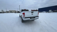 This Ram 2500 is equipped with: Cloth Front 40/20/40 Bench Seat, Radio: Uconnect 5 w/8.4 Display, 4G... (image 7)