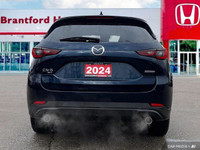 Experience the smooth ride and confident handling of this 2024 Mazda CX-5 GS. This well-maintained S... (image 4)