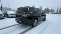 This Jeep Grand Wagoneer is equipped with: Palermo Leather-Faced Bucket Seats, Power moonroof, Remot... (image 8)