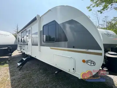 Forest River Wildwood X-Lite View travel trailer 24VIEW highlights: Versa-Slide (Storage, Bunks, Des...