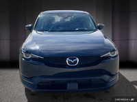 Le Mazda MX-30 EV GS 2024 est le premier véhicule entièrement électrique de Mazda, offrant une expér... (image 9)