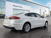 This Ford Fusion Hybrid boasts a Gas/Electric I-4 2.0 L/122 engine powering this Variable transmissi... (image 4)