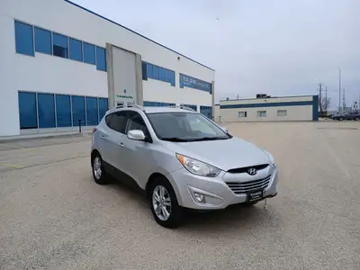 Drive with confidence in this 2011 Hyundai Tucson! With its spacious interior, smooth handling, and...