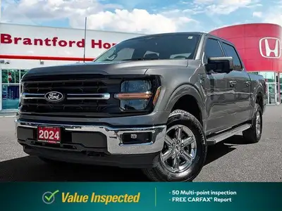 Dominate any terrain with this powerful 2024 Ford F-150 XLT Crew Cab. This robust truck boasts a pot...