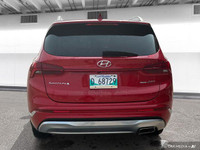 The 2021 Hyundai Santa Fe in Flame Red with Obsidian Black Nappa leather offers a panoramic sunroof,... (image 4)