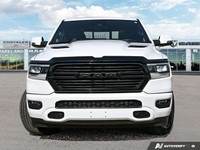 This 2023 Ram 1500 Sport Crew Cab 4x4 boasts a commanding presence with its Bright White exterior an... (image 1)