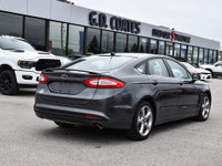 The 2015 Ford Fusion is a sleek, midsize sedan that offers a perfect blend of style, efficiency, and... (image 7)