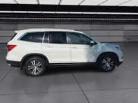 A versatile three-row SUV offering room for up to 8 passengers and plenty of premium features. The E... (image 8)