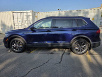 This Volkswagen Tiguan boasts a Intercooled Turbo Regular Unleaded I-4 2.0 L/121 engine powering thi... (image 7)