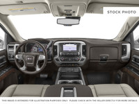Powerful presence meets sophisticated comfort in the 2018 GMC Sierra 1500 SLT, graced with a Dark Sl... (image 7)