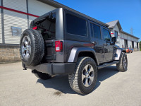 6 Speed manual transmission Jeep Sahara upgraded with Lift Kit, 33" Falken Wildpeak All Terrain tire... (image 6)