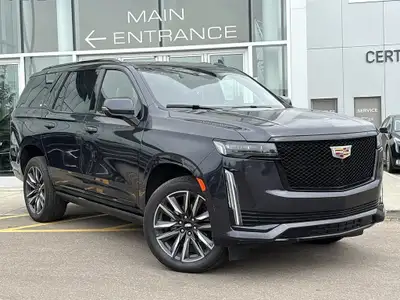 The 2023 Cadillac Escalade Sport Platinum stands out in Galactic Grey Metallic with 22-inch 12-spoke...