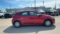 This Kia Rio is equipped with: Cloth, 6 Speakers, Cloth Seat Trim, Heated front seats, Radio: AM/FM/... (image 5)