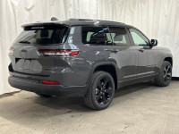 The 2025 Jeep Grand Cherokee L Limited 4x4 in sophisticated gray with its smooth 4x4 drivetrain prom... (image 3)