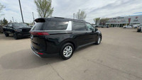 This Kia Carnival is equipped with: Cloth Seat Trim, Heated Front Seats, Heated Steering Wheel, AM/F... (image 2)