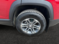 This 2025 GMC Terrain in Volcanic Red Tintcoat is equipped with AWD and Turbocharged Gas I4 1.5L/-TB... (image 8)