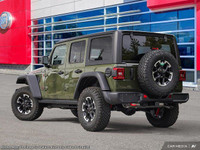This Jeep Wrangler has a strong Regular Unleaded V-6 3.6 L/220 engine powering this Automatic transm... (image 5)