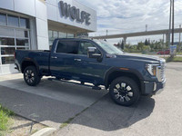 The 2025 GMC Sierra 3500 Denali in Downpour Metallic is a luxurious and capable heavy-duty pickup tr... (image 8)
