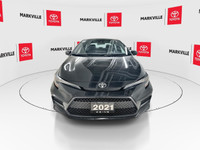 The 2021 Toyota Corolla SE is a sporty and stylish compact car that offers a combination of practica... (image 2)