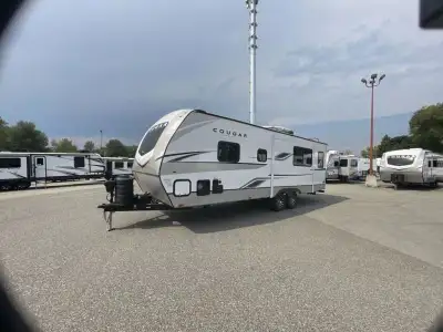 Keystone Cougar Half-Ton travel trailer 25RDSWE highlights: Private Bedroom 68in.in. Tri-Fold Sleepe...