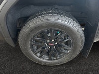 This 2025 GMC Sierra 1500 in Titanium Rush Metallic is equipped with 4WD and Turbocharged Diesel I6... (image 8)