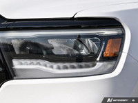 This 2023 Ram 1500 Sport Crew Cab 4x4 boasts a commanding presence with its Bright White exterior an... (image 9)