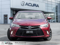 Finished in a Ruby Flare Pearl exterior that complements the Black leather/cloth interior, standing... (image 1)