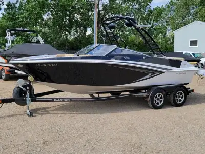 Financing available OAC. Includes snap on cover, Monster tower, 5L Mercruiser MPI engine, tandem axl...