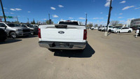 This Ford F-150 is equipped with: Cloth 40/Console/40 Front Seats, Radio: AM/FM SiriusXM w/360L, 12... (image 9)