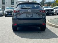 This 2021 Mazda CX-5 Signature has a Grey Exterior and Brown Interior with seating for 5. Equipped w... (image 5)
