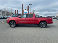 This 2020 Toyota Tacoma TRD Sport has a Red exterior and Black seats with seating for 5. Equipped wi... (image 1)