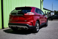 This 2020 Ford Edge is for sale today. This SUV has 68,872 kms. It's red in colour . It has a 8 spee... (image 2)