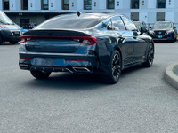 This 2021 Kia K5 GT-Line has a Grey Exterior and Black Interior with seating for 5. Equipped with a... (image 6)