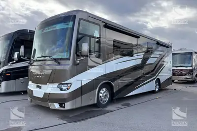 Introducing the 2024 Newmar Kountry Star diesel motorhome, a welcoming coach with warm wood cabinetr...