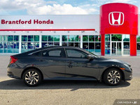 This 2019 Honda Civic Sedan EX boasts a stunning Cosmic Blue Metallic exterior and a sleek black fab... (image 6)