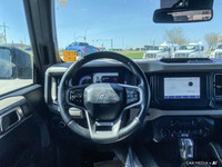 Unleash the thrill of open-air adventure with this stunning 2022 Ford Bronco convertible. Its powerf... (image 8)