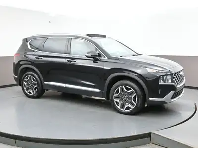 The 2022 Hyundai Santa Fe is a stylish midsize SUV offering multiple powertrains, including a 2.5L e...