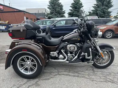 Check out this 110th Anniversary CANADIAN Harley-Davidson Tri-Glide 103ci with only 21,201kms. Be su...