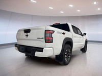 The 2023 Nissan Frontier Pro-4x, available at Moose Jaw Honda, is a robust and reliable truck design... (image 4)